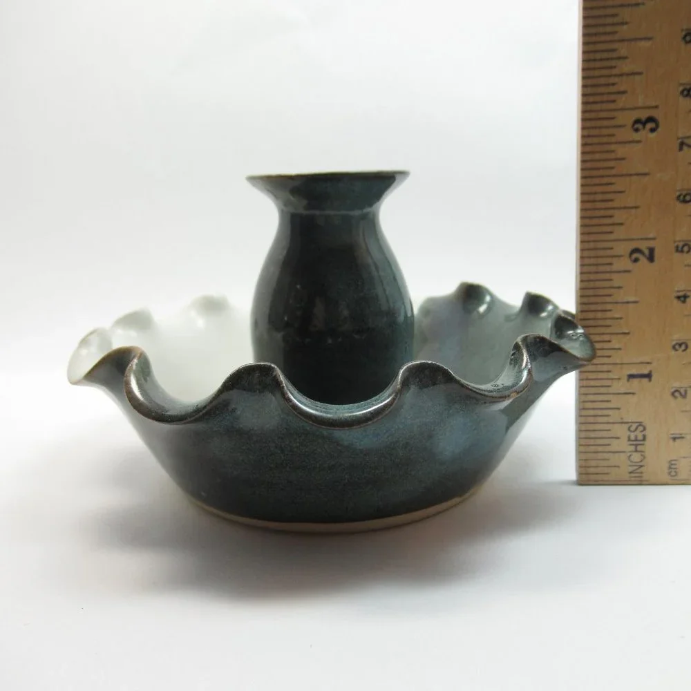 Sheltons Pottery this listing